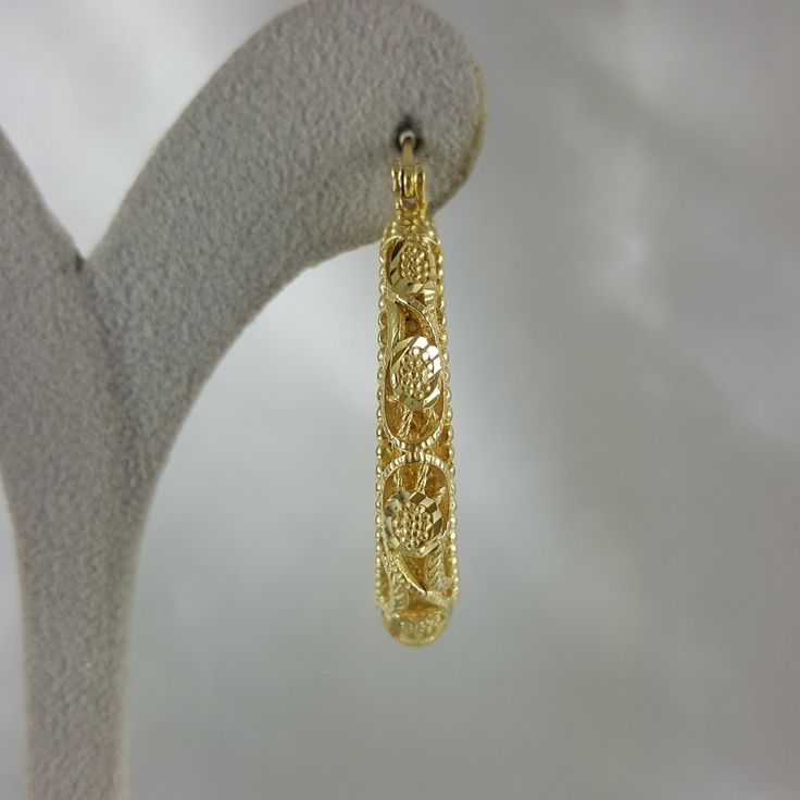 Elevate your style with these enchanting filigree earrings, designed to evoke admiration and elevate your festive looks, making them an ideal Christmas gift that exudes grace, elegance, and enduring beauty. 18K Gold Plated Floral Filigree Design Length: 40mm I 1.6 inch Width: 6mm I 0.2 inch , 13 grams Gold Hoop Bridal Earrings For Pierced Ears, Formal Hoop Earrings With Intricate Design, Gold Hoop Bridal Earrings, Elegant Filigree Hoop Earrings As Gift, Gold Hoop Earrings With Elegant Design, Gold Hoop Earrings With Elegant Design For Anniversary, Gold Hoop Bridal Earrings As Gift, Gold Earrings With Intricate Design For Anniversary, Elegant Gold Hoop Earrings For Festive Occasions