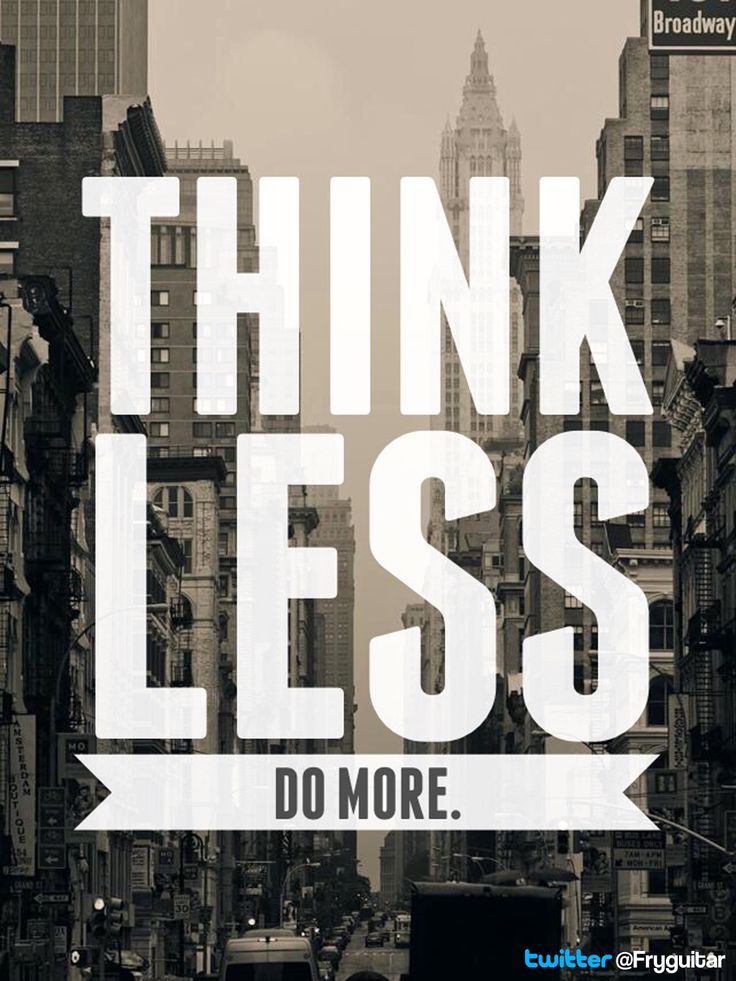 the words think less do more are shown in this black and white photo with city buildings