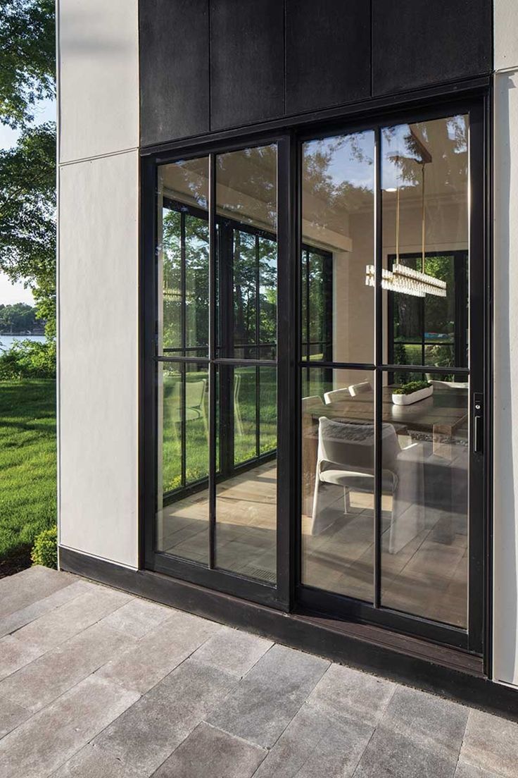 an open patio area with sliding glass doors