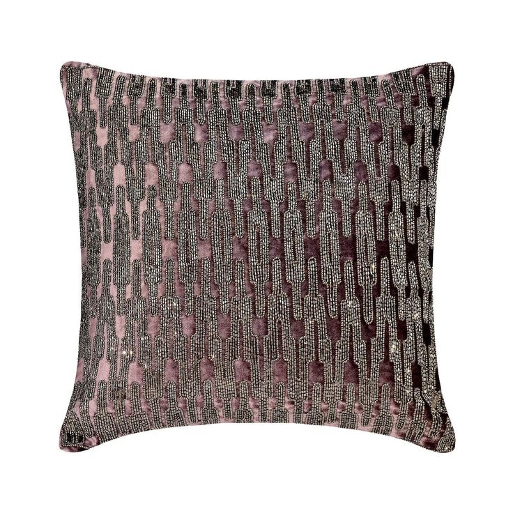 a pink and grey decorative pillow on a white background