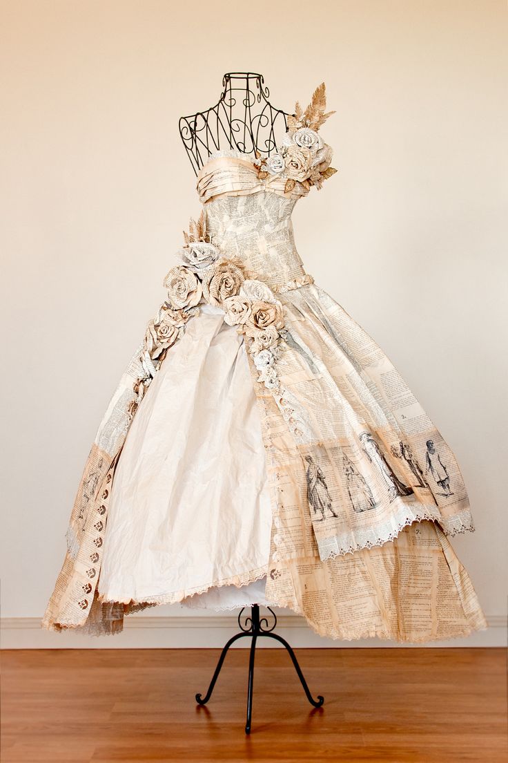 a dress made out of old clothes on display