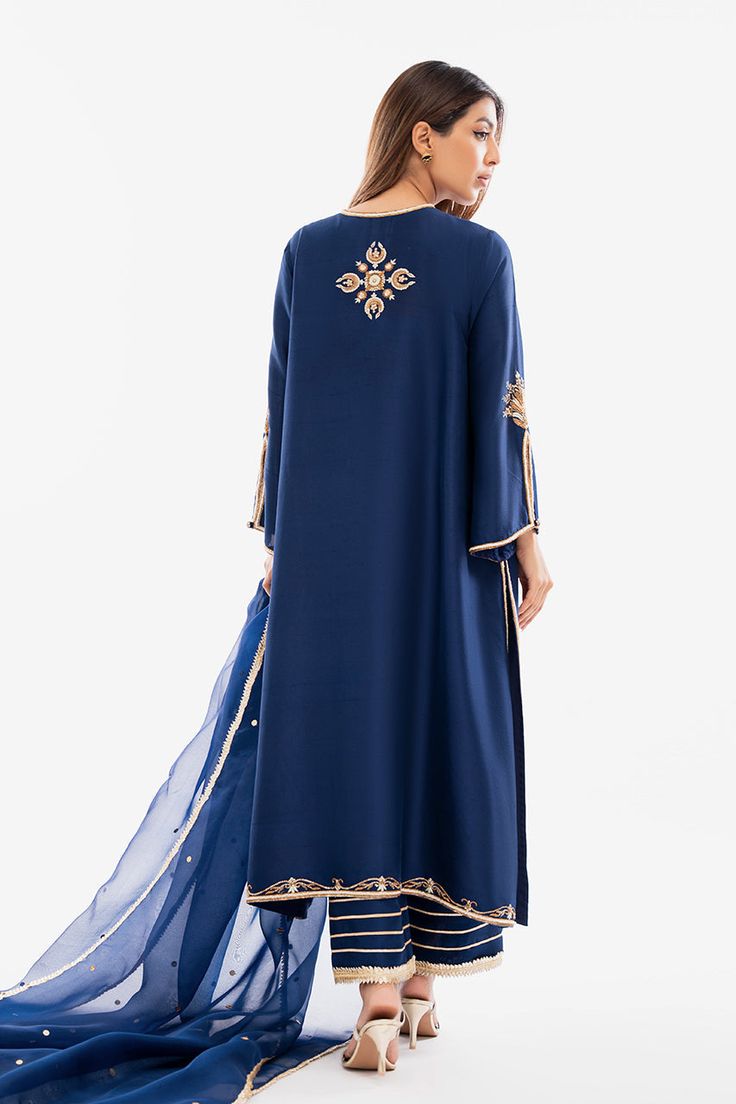 An elegant sapphire rawsilk coord set is delicately embellished with zardoze work and features a keyhole neckline. The look is paired with a matching organza dupatta and is ready to be styled for any festive occasion. Organza Shirt, Pakistani Designer Suits, Coord Set, Website Features, Keyhole Neckline, Silk Trousers, Organza Dupatta, Silk Dupatta, Silk Organza