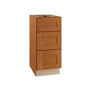 a wooden cabinet with three drawers on it