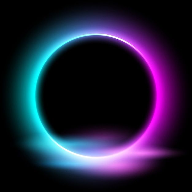 a black background with a blue and pink ring in the center, on top of a dark surface