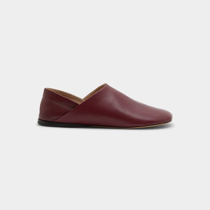 Loewe "Toy" leather slipper loafers Flat heel Round toe Slip-on style Made in Italy Calf Leather Slip-on Slippers, Modern Slip-on Moccasins With Leather Lining, Modern Formal Slippers With Leather Sole, Leather Slip-on Slippers With Calf Leather Footbed, Modern Closed Toe Slippers With Leather Sole, Modern Slip-on Slippers For Formal Use, Modern Formal Slippers With Flat Heel, Modern Formal Flat Heel Slippers, Modern Formal Slip-on Slippers