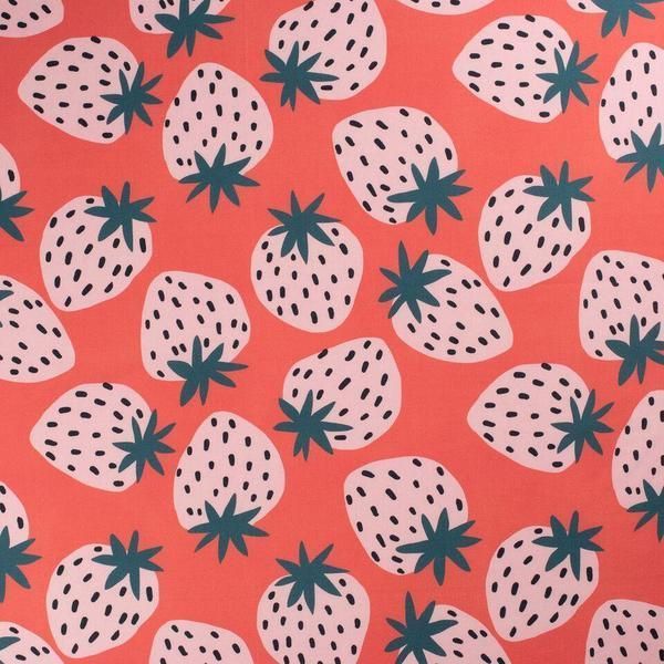 an orange background with black and white strawberries on it's sides, all over