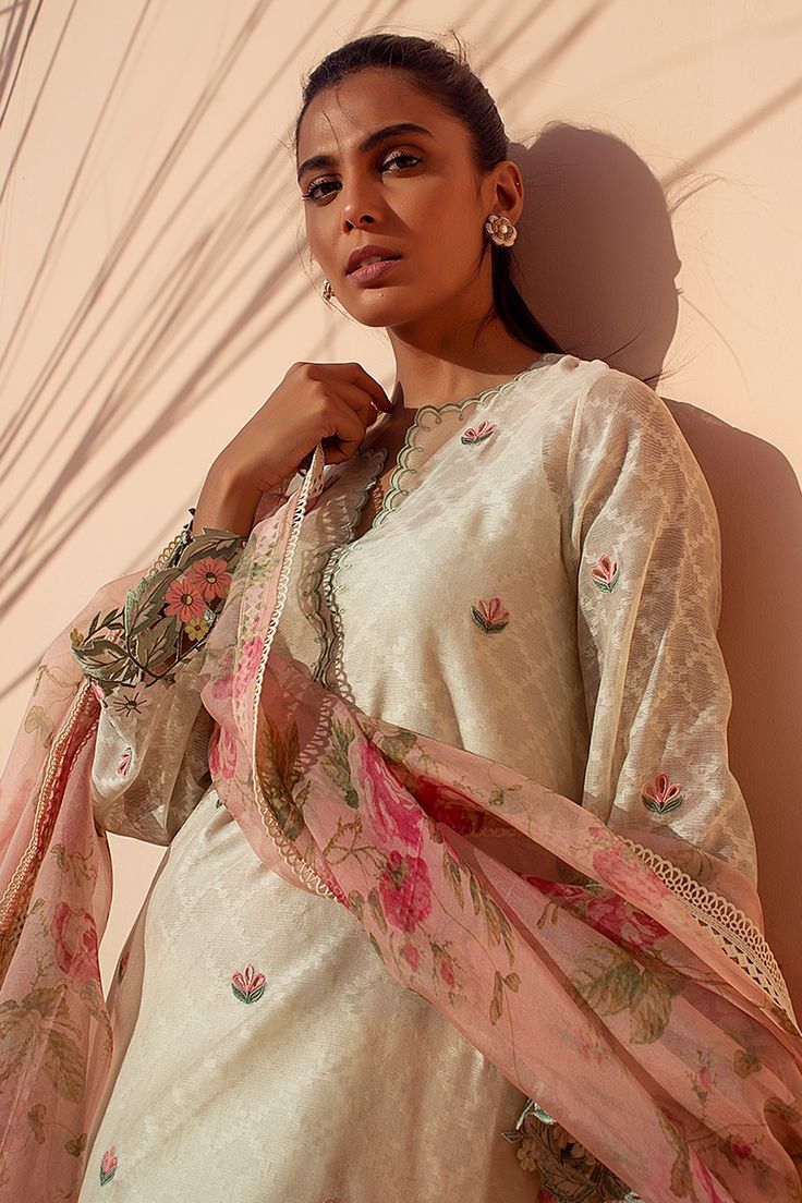 Kyra – Sania Maskatiya International Spring Floral Embroidered Cotton Silk Anarkali Set, Spring Bollywood Cotton Silk Sharara, Spring Bollywood Style Cotton Silk Sharara, Off White Kurta With Printed Motifs For Spring, Spring Off White Kurta With Printed Motifs, Elegant Pista Green Kurta With Floral Embroidery, Spring Silk Sharara With Dupatta, Pista Green Anarkali Salwar Kameez With Floral Print, Anarkali Salwar Kameez In Pista Green With Floral Print