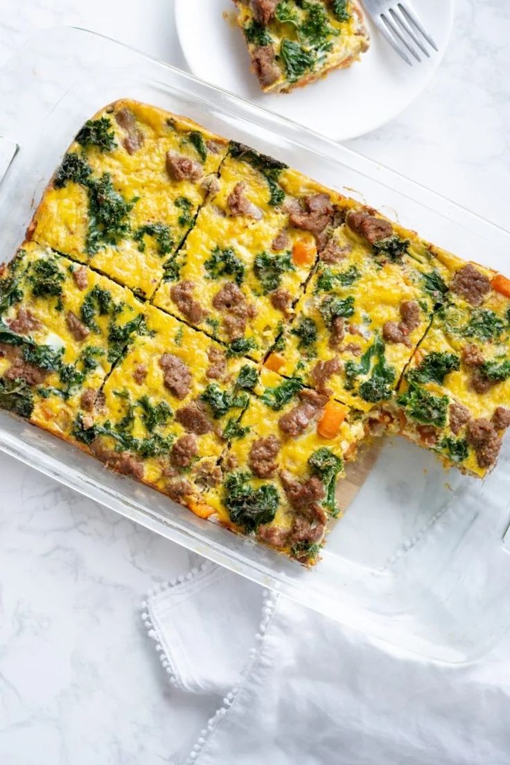 a casserole with meat, cheese and spinach