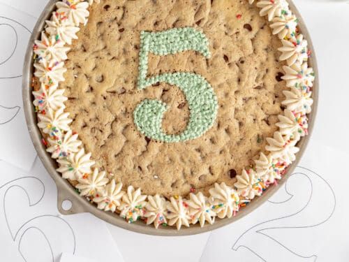 a birthday cake with the number five on it