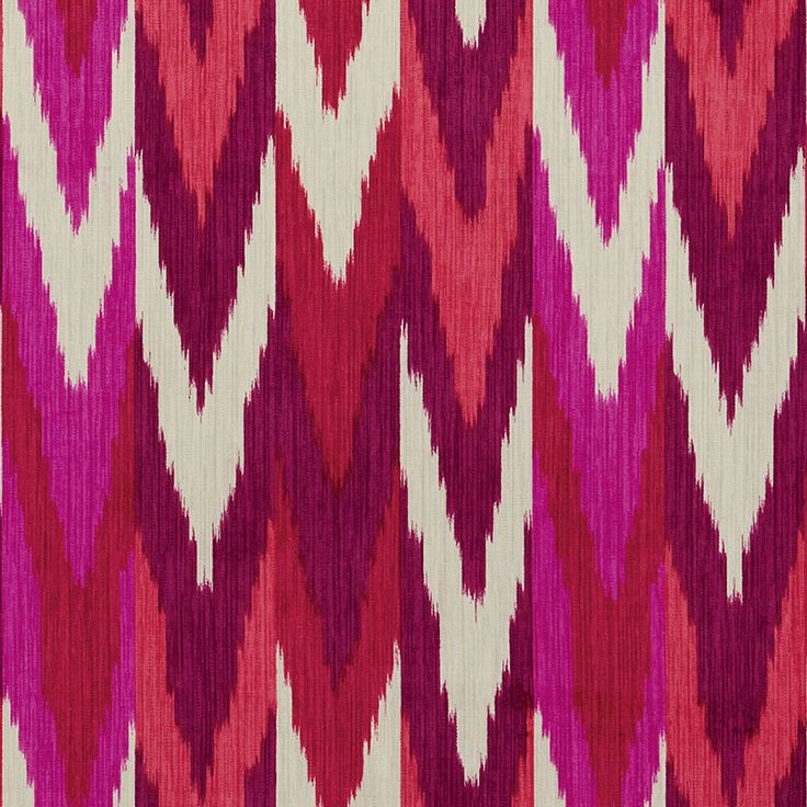 a red and white pattern on fabric