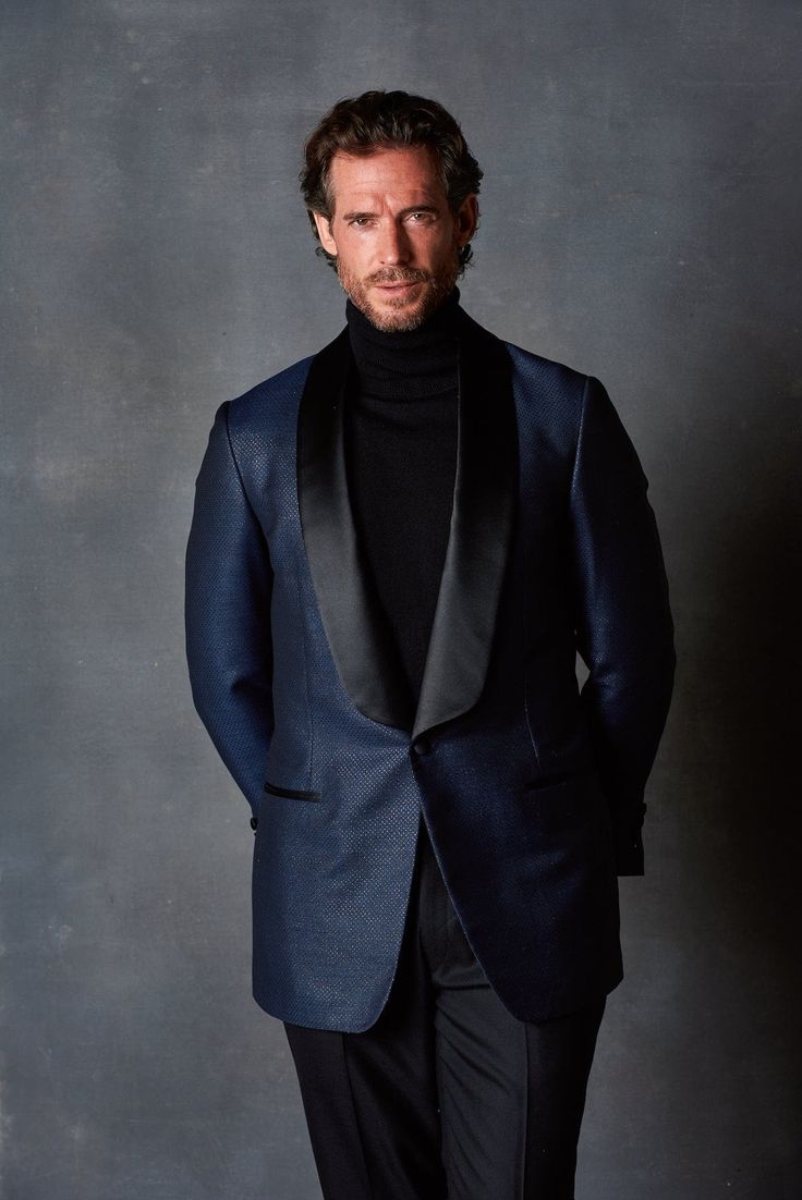 The essential dinner jacket is a statement-making formal garment that is festive, stylish and chic. Cut from a luxurious blend of wool and viscose - this jacket is smooth to the touch and shimmers every so beautifully in evening light. If you're looking for a stylish jacket that can be used for black tie, Holiday parties and epic evenings out - this is an excellent choice. Whenever you need to add a little style punch to "black tie", pull this one out and let the compliments - and refreshments - Elegant Outerwear With Suit Collar For Semi-formal Occasions, Semi-formal Silk Outerwear With Suit Collar, Classic Fitted Suits For Gala, Long Sleeve Suits For Winter Party, Elegant Silk Blazer For Fall, Tailored Tuxedo Blazer For Gala, Tuxedo Style Tailored Blazer For Gala, Wool Tuxedo With Lapel Collar, Sleek Party Blazer With Suit Collar