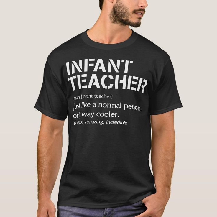 a man wearing a black t - shirt with the words infant teacher in white on it