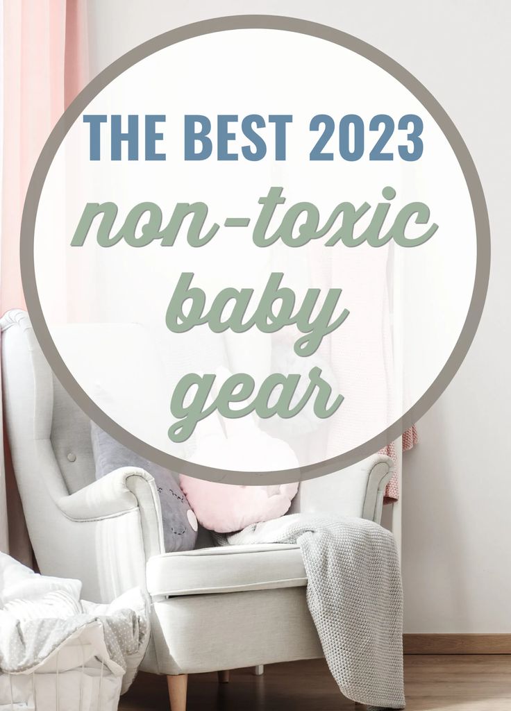 a white chair sitting next to a window with the words non - tonic baby gear on it