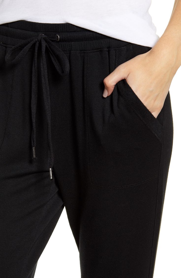 Supersoft and stretchy, these joggers have a slim yet relaxed fit that feels right at home in your casual wardrobe. 27 1/2" inseam Elastic/drawstring waist Front slant pockets 95% modal, 5% spandex Machine wash, tumble dry Made in the USA t.b.d. Black Athleisure Joggers For Lounging, Casual Black Activewear For Lounging, Stretch Straight Leg Joggers For Leisure, Leisure Straight Leg Stretch Joggers, Stretch Joggers With Side Pockets For Lounging, Black Joggers With Ribbed Waistband For Lounging, Everyday Pull-on Style Joggers, Trendy Stretch Joggers For Lounging, Black Casual Joggers For Loungewear