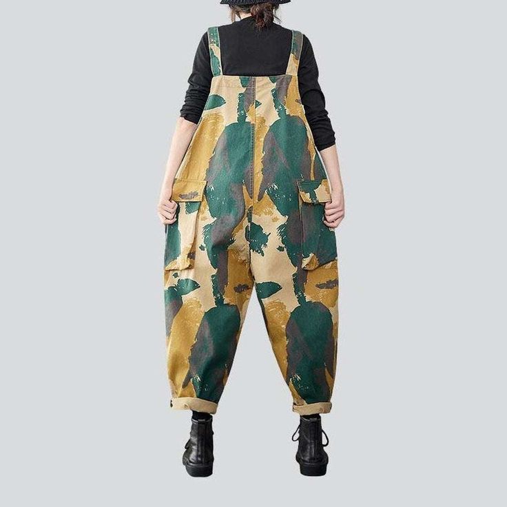 Unveil your inner style icon with our signature military-inspired Y2K cargo jumpsuit from the 2023 Spring-Summer Collection!Why You'll Fall In LoveInspired by the legendary fashion sense of the Y2K era. this jumpsuit features a harmonious blend of nostalgia and modern fashion. Every detail. from its vibrant painted prints to its sanded finish. will transform your look into a timeless masterpiece.Unmissable Highlights: Y2K Inspired: Step back into the millennium's iconic fashion scene with this j Cargo Jumpsuit, Denim Dungaree, Jeans Overall, Y2k Era, Street Style Trends, Iconic Fashion, Outerwear Outfit, Current Fashion, Current Fashion Trends