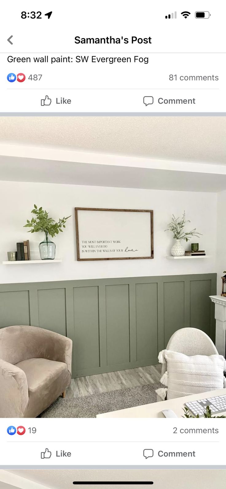 two chairs in a room with green paneling on the walls and pictures above them