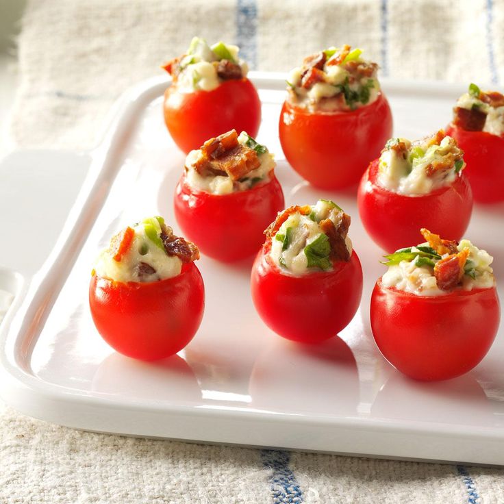 small stuffed tomatoes on a white tray