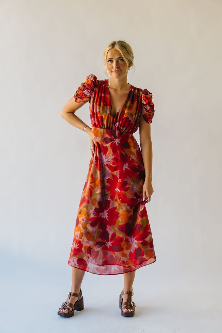 The Fannon Floral Midi Dress in Red Multi is sure to turn heads with its vibrant colors and playful floral pattern. With a comfortable and flattering midi length, this dress is perfect for any occasion. Bring a touch of whimsy to your wardrobe with this one-of-a-kind dress. Details self/lining: 100% polyester Fabric Care Guide Here Sizing & Fit Measurements are approximate and taken while laying flat across the front. Not doubled. small: bust = 18"; length = 48" medium: bust = 19"; length = 48.5 Puff Sleeve Sweater, Striped Sweater Dress, Striped Knit Dress, Nursing Friendly, Jeans Jumpsuit, Floral Midi Dress, Striped Knit, Cardigan Jacket, Small Bust