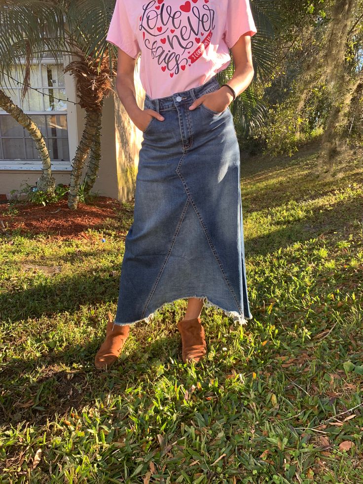 High Rise Denim Midi Skirt with Pockets, Button and Zip Fly and Cutoff Fringed Asymmetric Hem. 70% Cotton, 28% Polyester, 2% Spandex. Shortest length 27" full length 36" Runs Small (please choose according to your size number) Small (0/2) Medium (4/6) Large (8/10) Asymmetrical Medium Wash Denim Skirt, Relaxed Full Length Denim Skirt In Medium Wash, Medium Wash Full Length Relaxed Denim Skirt, Casual Summer Maxi Skirt With Frayed Hem, Dark Wash Denim Asymmetrical Skirt, Full-length Denim Skirt With Frayed Hem, Full Length Denim Skirt With Frayed Hem, Summer Full-length Skirt With Frayed Hem, Summer Full Length Skirt With Frayed Hem