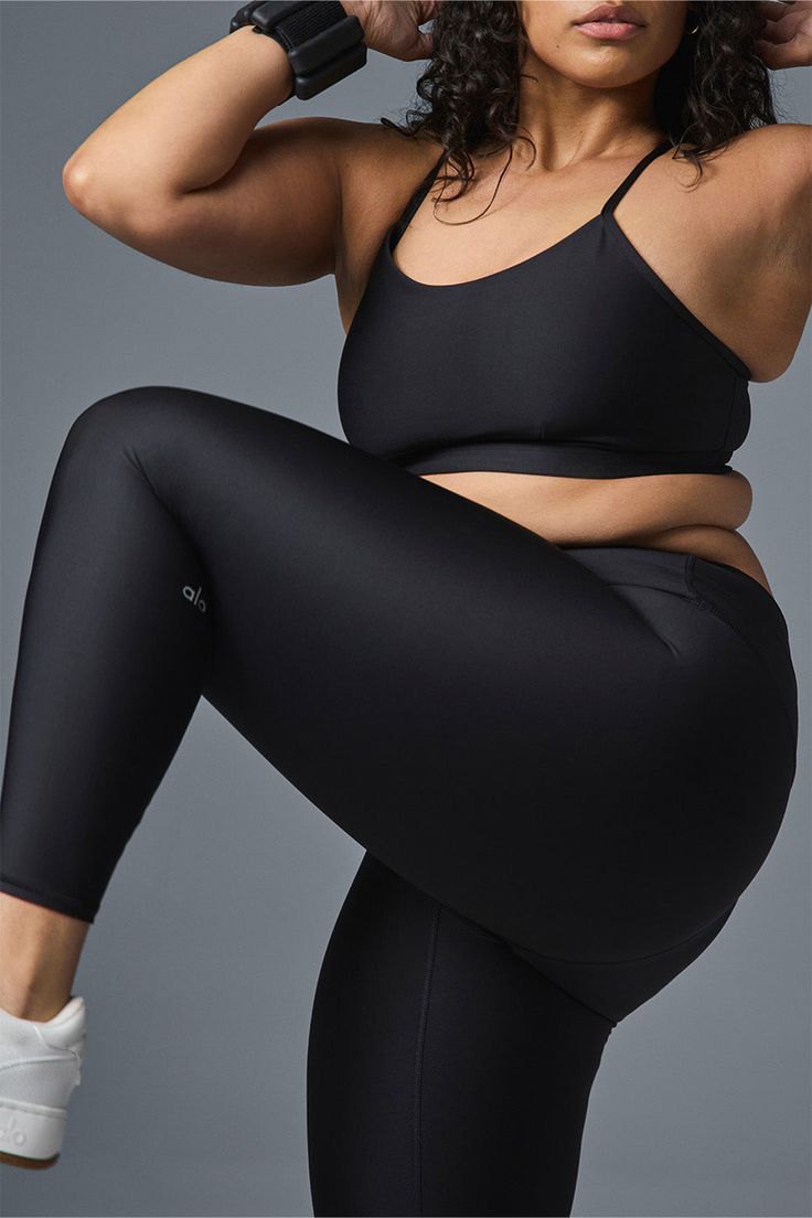 Wondering why these leggings are a fan favorite? Maybe it’s the sculpting, subtly sheeny, high-compression Airlift fabric. Or the fact that they fit like a glove, complete with a wide, double-layered waistband for a holds-you-in feel. Or the ⅞ length hems that are perfect for petites or an above-the-ankle fit. Pick your color and get ready to wear yours on repeat. Sleek Activewear With Built-in Bra And Stretch, Sleek Activewear With Built-in Bra, Black Compression Leggings By Alo Yoga, Sleek Compression Activewear By Alo Yoga, Black Compressive Alo Yoga Leggings, Sleek Activewear With Built-in Bra For Gym, Sleek Gym Activewear With Built-in Bra, Alo Yoga Sleek Compressive Activewear, Sleek Compressive Alo Yoga Activewear