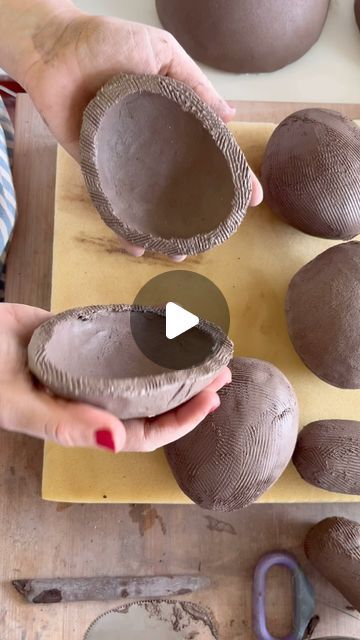 someone is making clay bowls with their hands