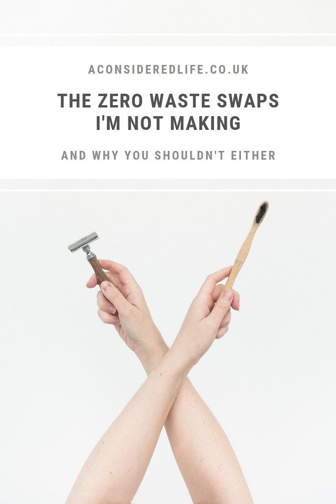 two hands holding a toothbrush with the words, the zero waste swaps i'm not making and why you shouldn't either