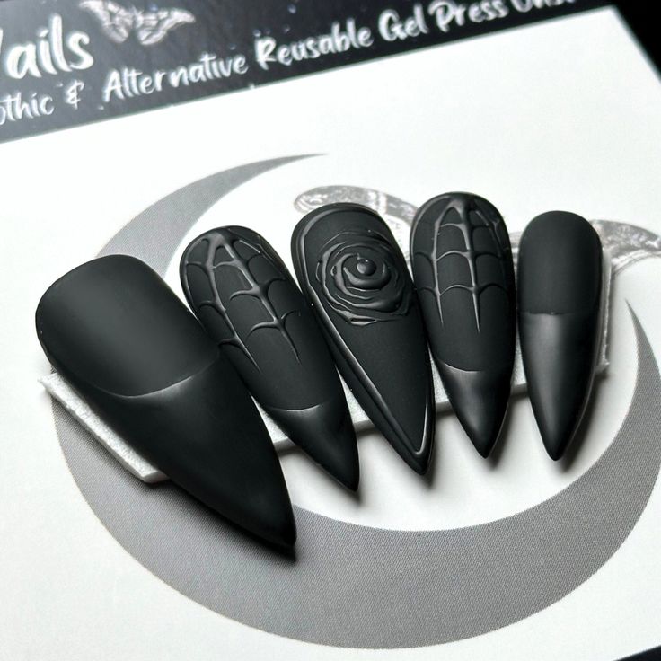 Welcome to LD Nails! 🖤 One set of 10 REUSABLE Press On Nails 🖤 🖤 Made to order in your shape & size 🖤 Black Widow: Matte black on Matte Black Rose & Spiderweb Vampy Halloween press on nails. ‼️ These nails need to be matte, they cannot be ordered in a glossy finish 👉 Please leave your custom sizing (if applicable) in the personalization box! Purchase INCLUDES an application kit! It consists of: 🖤 detailed application & removal instructions 🖤 a sealed and sanitary mani kit (100/180 file, buffer block, cuticle pusher) 🖤 2 alcohol pads 🖤 nail tabs or glue (glue is standard, request tabs in the personalization box if you prefer them!) *Only one kit is sent per order. Extra kits and kit contents can be picked up in the “Extras” section! Est. 2020: LD Nails specializes in custom Gothic, Matte Press On Nails, Minimal Goth Nails, Goth Press On Nails, Matte Halloween Nail Designs, Gothic Wedding Nails, Black Gothic Nails, Nail Themes, Goth Nail Art, Bat Nails