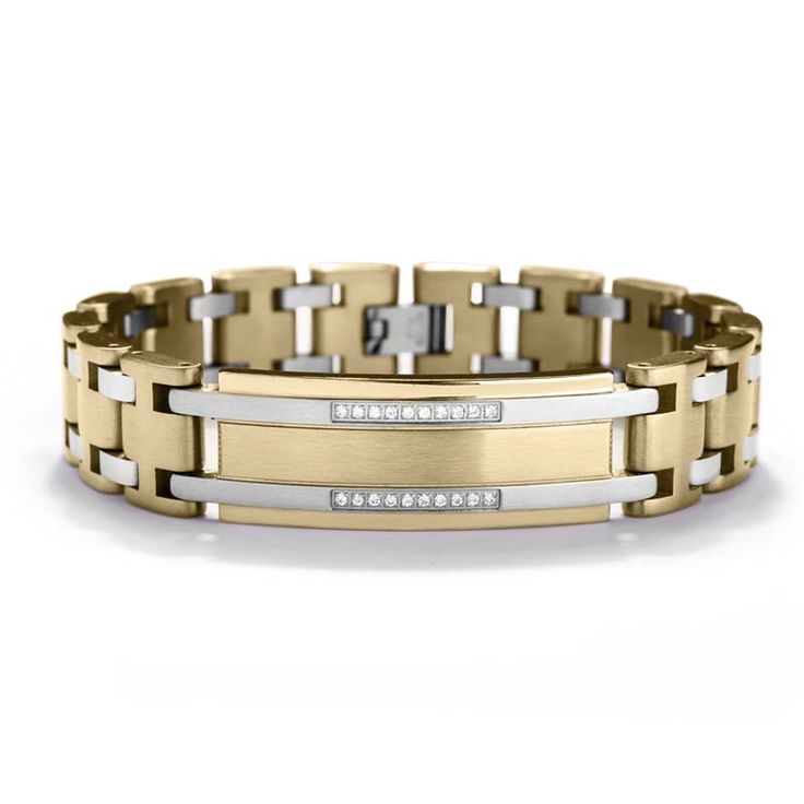 This exquisite bracelet has it all, premium grade stainless steel finished in yellow gold complimented by accents of plain steel. In the center plate are two impressive rows of eye-catching Diamondeau® - the Supreme Diamond Alternative stones for an added touch of luxury. A real unique piece. Unique Mens Bracelet, Mens Accessories Bracelet, Mens Diamond Bracelet, Stainless Steel Bracelet Men, Swiss Luxury, Jewelry Bracelets Gold, Mens Gold Bracelets, Diamond Alternatives, Men's Bracelet