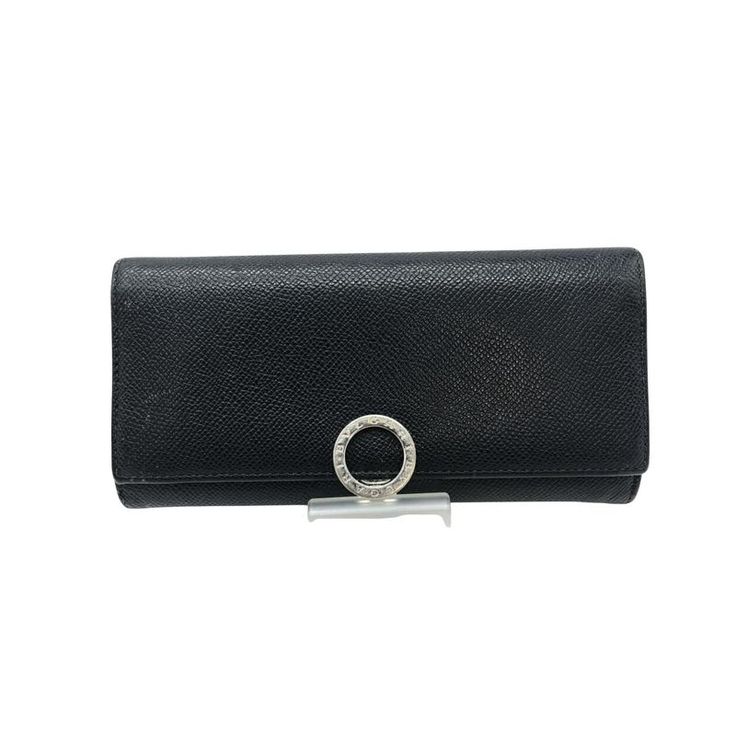 Br : Bulgari Model: Bulgari Bulgari Color: Black Material: Leather Inclusions: Dimensions: 8.5cm X 18.5cm X 1.5cm Serial Number: Na Country Of Origin: Italy Condition: Ab - Good Condition.Introducing The Bvlgari Bvlgari Long Wallet A Versatile Accessory Designed For Both Men Women. Crafted By The Esteemed Br Bvlgari This Bi-Fold Wallet Showcases The Iconic Bvlgari Bvlgari Design Representing A Perfect Fusion Of Elegance Style.While Exhibiting Traces Of Usage The Wallet Maintains Its Allure With Elegant Bifold Wallet As Gift, Elegant Bifold Wallets For Gift, Elegant Bifold Wallets For Gifts, Elegant Bifold Wallets As Gifts, Elegant Business Wallets With Magnetic Closure, Elegant Formal Wallet With Magnetic Closure, Elegant Business Wallet With Magnetic Closure, Elegant Rectangular Formal Wallet, Designer Evening Wallets With Magnetic Closure