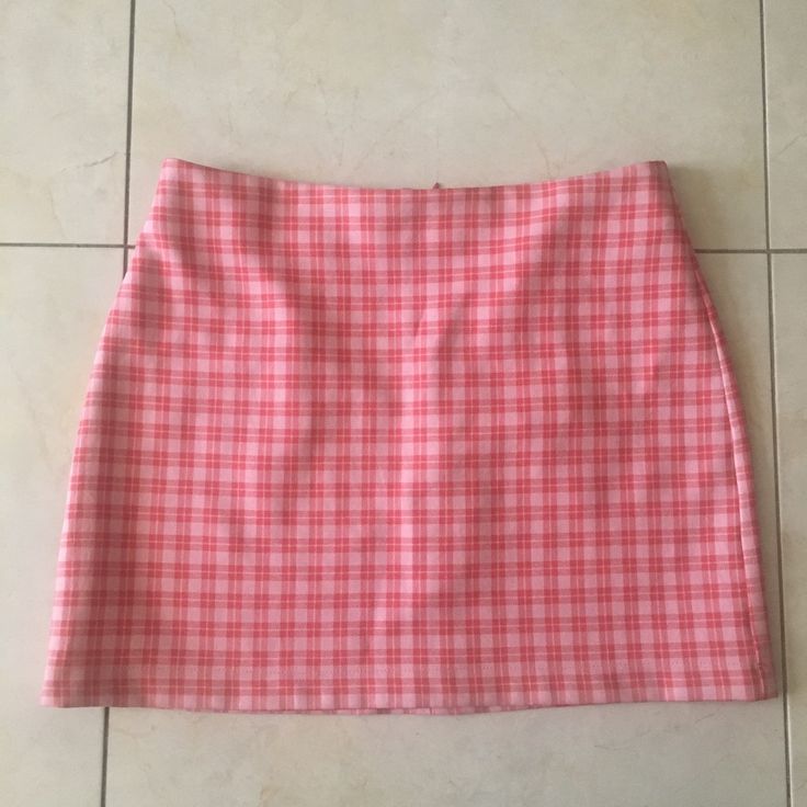 Nwt Urban Outfitters Women's Plaid Mini Skirt -Color = Two-Tone Pink Plaid -Fit = High Waist Fit, Flat Front, Rear Darts For Shaping, And Rear Zipper Closure. Unlined. -Content = 100% Polyester -Condition = New With Tags. Never Worn. Measurements (Approx.): -Overall Length = 14" From Waist To Bottom Hem -Waist = 13.75" High Waist Pink Cotton Skirt, High-waisted Pink Cotton Skirt, Trendy Pink Pencil Mini Skirt, Trendy Pink Pencil Skirt, Urban Outfitters Summer Skort With Lined Skirt, Urban Outfitters Stretch Mini Skirt, Urban Outfitters Mini Skort For Summer, Urban Outfitters Skort With Lined Skirt For Summer, Preppy Pink Cotton Skirt