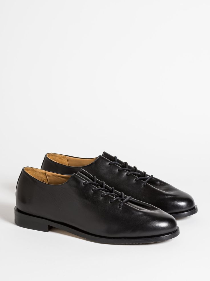 Introducing the Edouard Oxford derby in luxurious Black leather, featuring a light leather sole with rubber inserts for enhanced durability and grip. This one-piece design showcases elegant pinched lacing, exuding sophistication and timeless style. Crafted with meticulous attention to detail, these derbies seamlessly blend classic aesthetics with modern functionality, making them a versatile and refined choice for any occasion.-Black polished leather calf-Black Lightweight leather sole with rubb Black Polish, Loafer Sneakers, Derby Shoes, Light Stain, Showcase Design, Leather Material, Timeless Style, Loafer Shoes, Derby