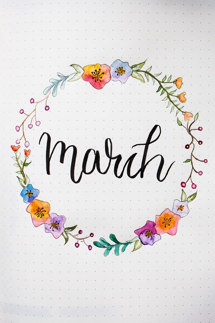 the word march written in watercolor on a notebook with flowers and leaves around it