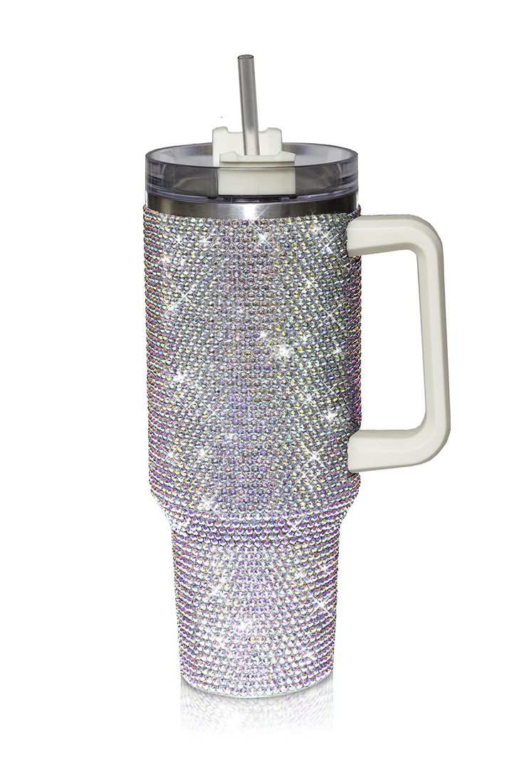 the tumbler cup has a handle and is decorated with silver sequins