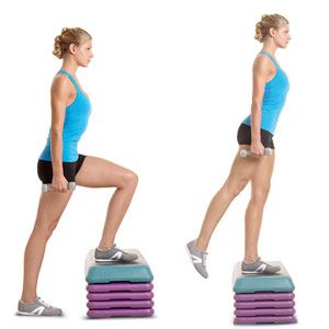 a woman standing on top of a stack of purple and blue yoga mats