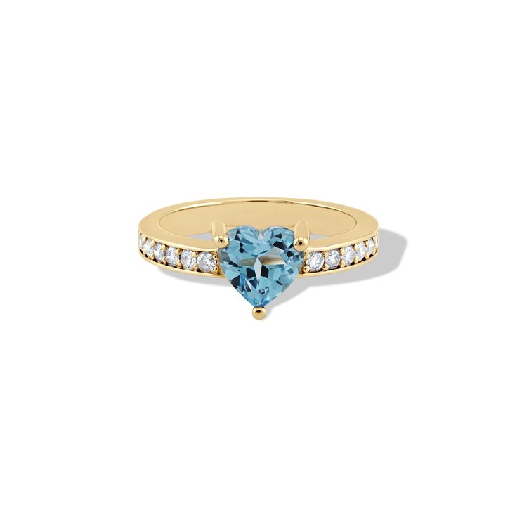 Heart-Shaped Blue Topaz and Diamond Ring in 14k Yellow Gold Show your love with this enchanting Heart-Shaped Blue Topaz and Diamond Ring, exquisitely crafted in 14k yellow gold. Features a 7mm heart-shaped natural blue topaz gemstone 12 natural diamonds (SI1, G color) set along the band Made from high-quality 14k yellow gold 3mm wide band for a comfortable fit Custom engraving available Includes a cleaning cloth, certificate of authenticity (COA), a pouch, and a box Ideal for those who appreciate elegant and timeless jewelry, this stunning blue topaz and diamond ring is perfect for special occasions or everyday wear. Add this beautiful piece to your collection today and let your love sparkle. Yellow Gold Heart Cut Ring With Accent Stones, Yellow Gold Heart Cut Ring With Center Stone, Blue Topaz Ring In Yellow Gold For Promise, Yellow Gold Heart Ring With Accent Stones, Yellow Gold Heart Cut Birthstone Ring, Blue 14k Gold Heart Cut Jewelry, Blue 14k Gold Jewelry With Heart Cut, 14k Gold Heart Cut Birthstone Ring With Center Stone, Heart Cut Topaz Gemstone Ring For Promise