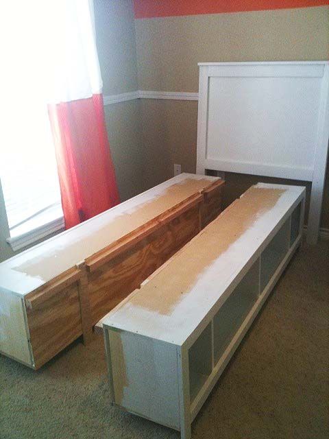 the bed is made up and ready for us to use in the room that needs to be remodeled