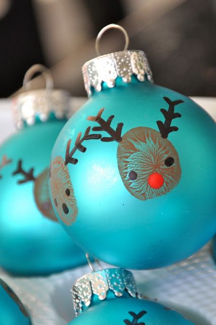 christmas ornaments with hand painted designs on them