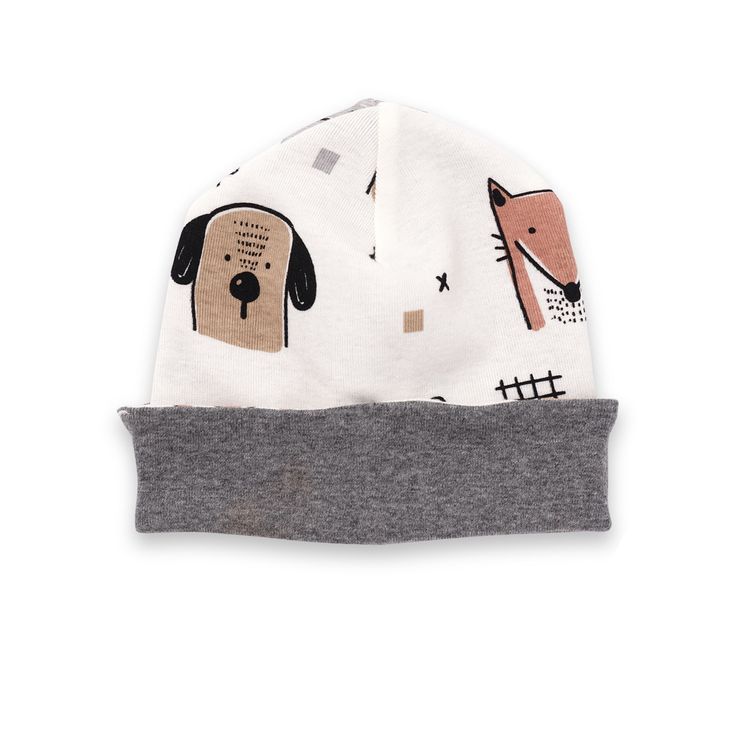 a white hat with dogs on it and grey trimmings, sitting on top of a