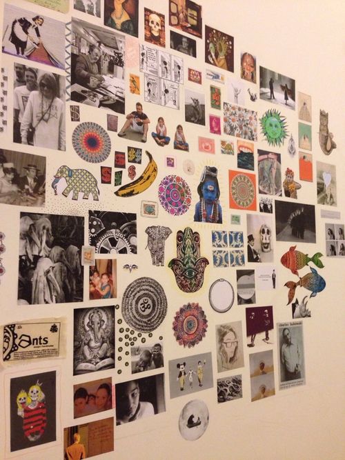 a white wall covered in lots of pictures and magnets on it's side