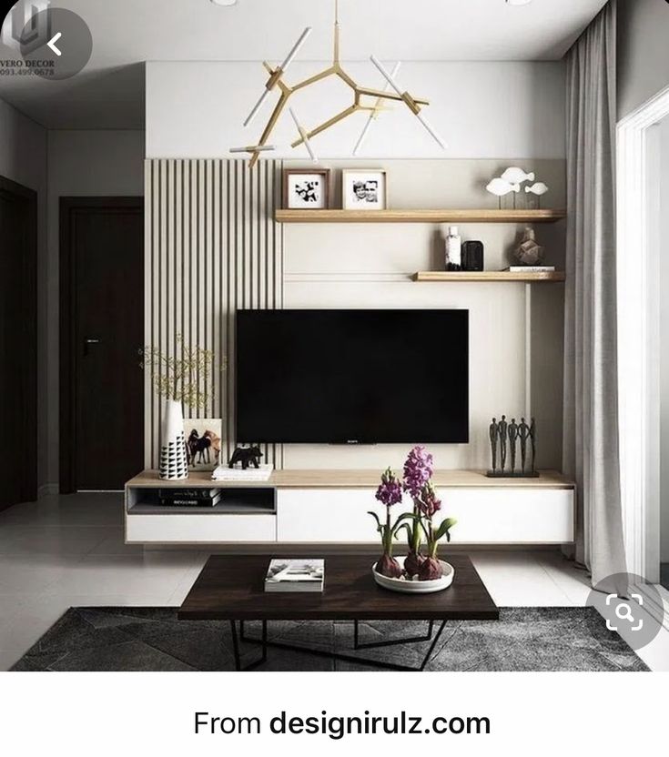 a living room with white walls and shelves filled with plants, vases and pictures on the wall