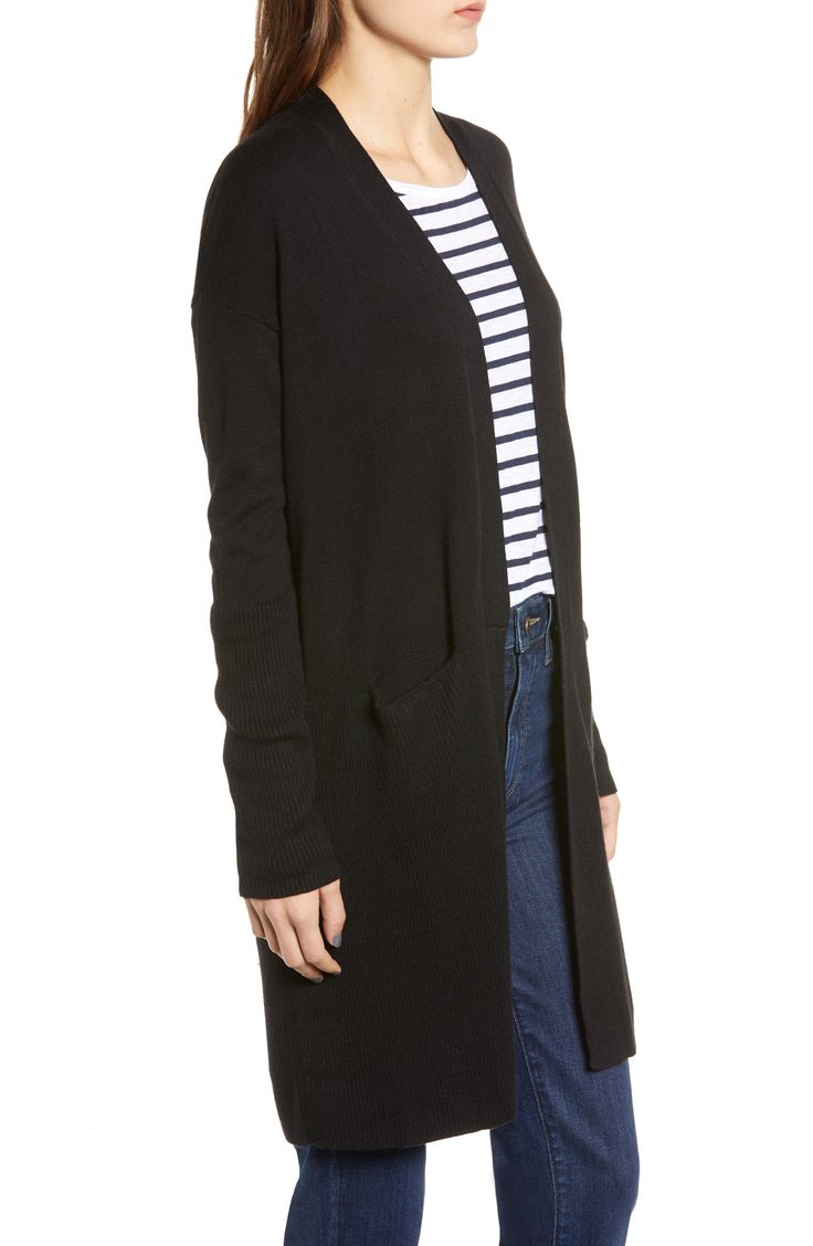 From chilly offices and classrooms to cool movie theaters, make sure you always have this cardigan—featuring a touch of soft cashmere—to cozy up to. Open front Long sleeves Front patch pockets 40% rayon, 30% nylon, 25% polyester, 5% cashmere Hand wash, dry flat Imported t.b.d. Modern Cardigan For Workwear In Fall, Modern Fall Cardigan For Workwear, Relaxed Fit Cardigan For Workwear In Fall, Modern Everyday Sweater For Fall, Modern Sweater For Everyday Fall Wear, Black Cashmere Outerwear For Spring, Elegant Everyday Cardigan With Pockets, Black Cashmere Cardigan For Work, Black Cashmere Spring Outerwear