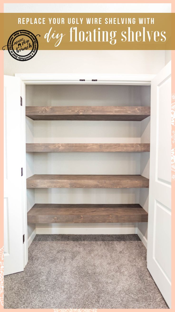 an empty walk in closet with shelving shelves and carpeting on the floor below