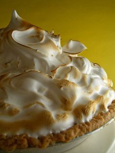 a close up of a pie on a plate