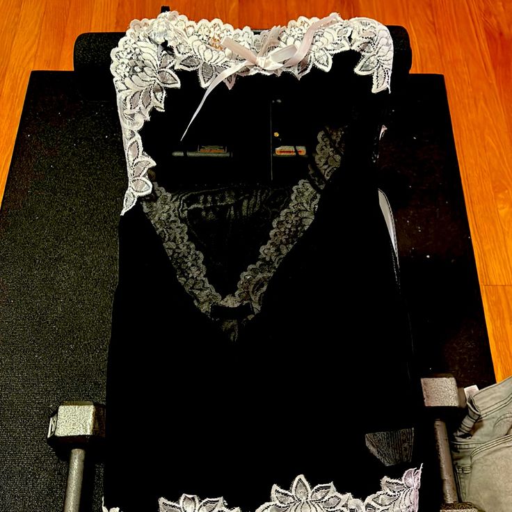 Black & White Lace Nightgown. Halter Top With Neck Tie Adjustment. Non Smoking Home; Never Worn. Sleeveless Lace Sleepwear For Night Out, Black Camisole Nightgown For Night Out, Evening Sleeveless Sleepwear With Lace Trim, Black Camisole Nightgown For Loungewear, Black Sleeveless Sleepwear For Evening, Fitted Black Nightgown For Loungewear, Elegant Black Nightgown For Bedtime, Black Fitted Nightgown For Loungewear, Black Lace Sleepwear