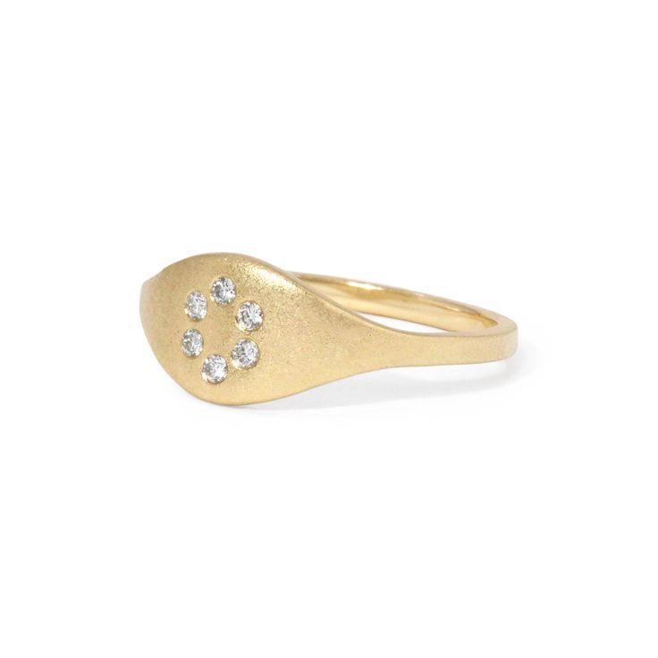 The true beauty of this ring lies in its discreet yet elegant circle of diamonds. Subtly nestled within the design, these diamonds add a touch of understated glamour, elevating your look without overwhelming it. Details: White diamonds .09tcw 14k gold Ready to ship - size 7 All other sizes are made-to-order and can take up to three weeks to ship Minimalist Diamond Stackable Rings With Accents, Minimalist Stackable Diamond Rings With Accents, Single Diamond Ring Jewelry, Diamond Stackable Rings With Pave Setting, Elegant Oval Stackable Rings With Diamond Accents, 14k Gold Diamond Ring With Single Diamond, Diamond White Open Ring With Single Diamond, Minimalist Diamond Ring With Round Cut Accents, Minimalist Diamond Ring With Diamond Accents