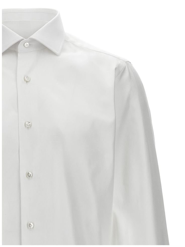 Cotton shirt with button closure, long cuffed sleeves. Composition: 100% cotton Classic Long Sleeve Dress Shirt With Button Closure, Cotton Long Sleeve Shirt With Button Cuffs, Timeless Cotton Tops With Button Cuffs, Timeless Long Sleeve Shirt With Placket, Modern Cotton Business Tops, Long Sleeve Cotton Tops With Covered Buttons, Cotton Long Sleeve Tops With Covered Buttons, Modern Cotton Tops For Business, Timeless Semi-formal Cotton Shirt