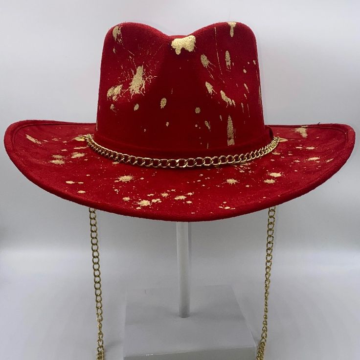 “Biz” Red Suede Rancher Hat By Www.Thechapeauholic.Com Follow Me On Ig @Thechapeauholic Hand Painted Gold Chain Signature Feather 3.5 Inch Brim/4 Inch Crown Medium 57cm-59cm Elastic Sweatband Gold Fedora Hat For Winter, Trendy Hats For Kentucky Derby Festival, Trendy Kentucky Derby Bucket Hat, Red Short Brim Hat For Fall, Western Style Party Hat For Fall, Western Party Hat For Fall, Trendy Bucket Hat For Kentucky Derby, Trendy Fedora With Short Brim For Country Events, Trendy Fedora For Country Events With Short Brim