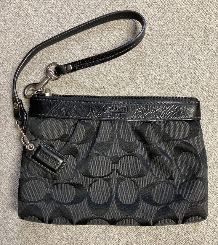 COACH Black Wristlet Canvas Leather. Good condition Black Coach Clutch, Coach Black Leather Wallet, Coach Black Wristlet With Removable Pouch, Black Coach Coated Canvas Shoulder Bag, Coach Black Wristlet With Zipper Pouch, League Of Legends Poster, Black Wristlet, Canvas Leather, Bags Handbags