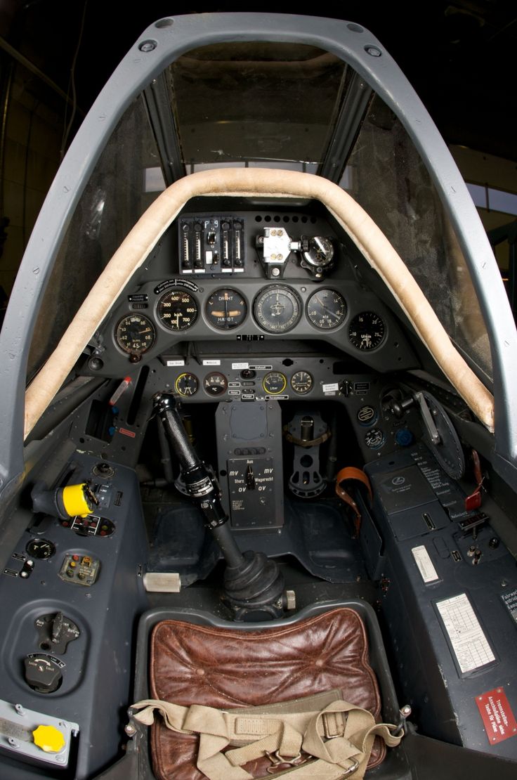 the cockpit of an airplane with instruments and other items in it's display area