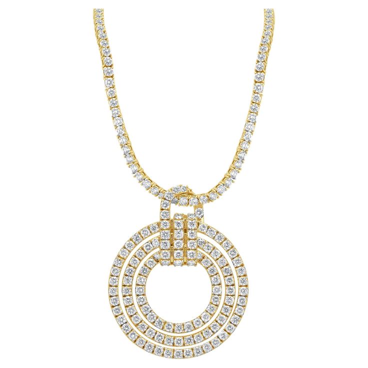 Designer: custom Material: 14K yellow gold Diamonds: 247 round brilliant cut = 21.35cttw Color: G Clarity:VS- SI1 Dimensions: necklace measures 16-inches in length Weight: 32.81 grams Diamond Tennis Necklace, Circle Diamond, Tennis Necklace, Link Necklace, Diamond Pendant, Round Brilliant, Gold Diamond, Tennis, Jewelry Necklaces